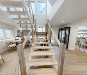 White wood U-shaped staircase
